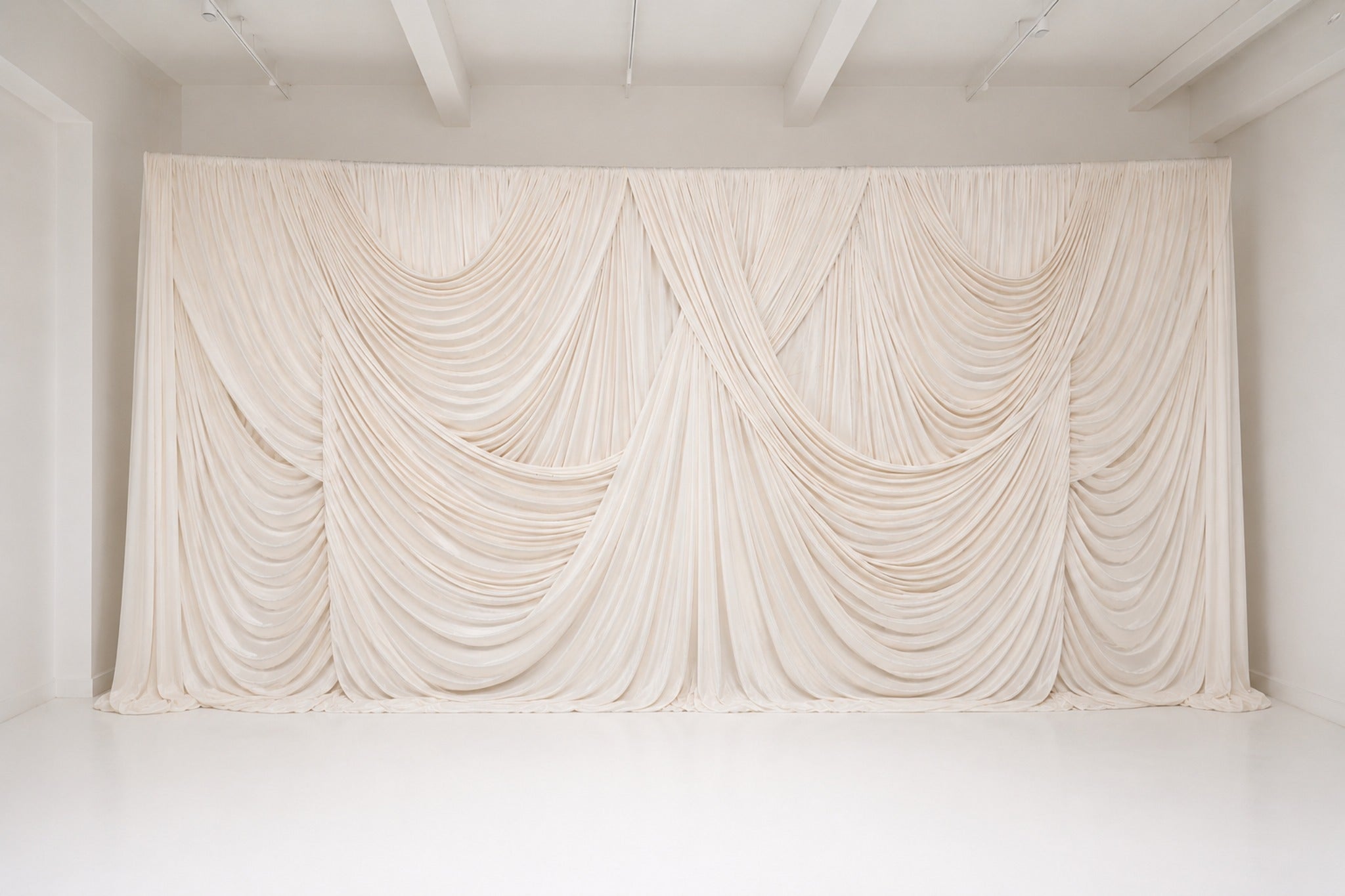 Luxury draped backdrop in ivory tones