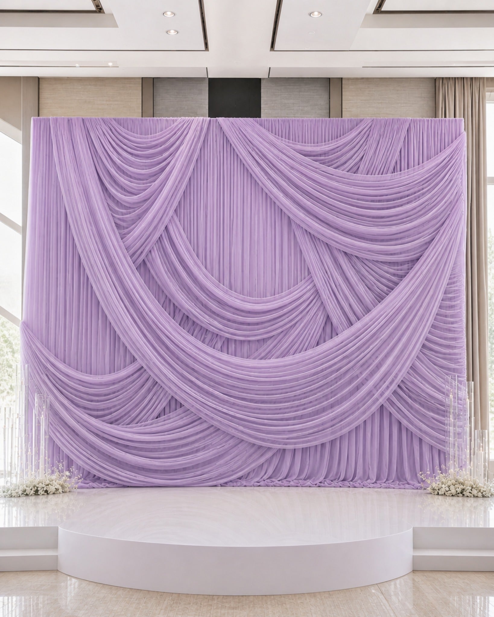 Lavender draped backdrop example used to show the styling experience